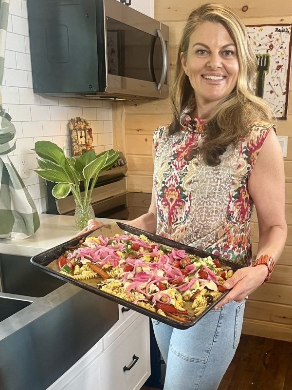 Charmaine Broughton Recipes Blog - holding a sheet pan of chickpea pasta shwarma
